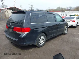 2009 Honda Odyssey EX-L with VIN 5FNRL387X9B051750, listed as a IAAI auction lot 41953221 with 205,142 mi miles. Bid and sale history available at carsss.com. Image 4.