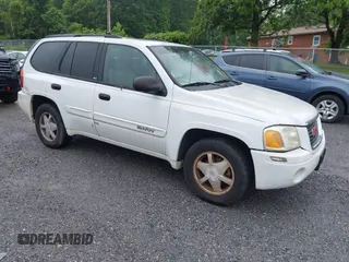 2003 GMC Envoy SLE z VIN 1GKDT13S832154982, wystawiony jako IAAI lot #42366321 z przebiegiem 269 347 mil mil oraz . Historia ofert i sprzedaży dostępna na DreamBid. Obrazek 1.