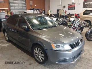2011 Volkswagen Jetta Sedan SE PZEV with VIN 3VWDZ7AJ9BM369301, listed as a IAAI auction lot 41982641 with 114,217 mi miles. Bid and sale history available at carsss.com. Image 1.