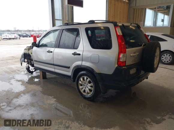 2006 Honda CR-V EX with VIN JHLRD78856C033763, listed as a IAAI auction lot 41715433 with 220,490 mi miles and . Bid and sale history available at carsss.com. Image 3.