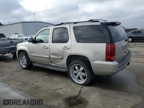 2007 GMC Yukon SLT with VIN 1GKFK130X7R106388, listed as a Copart auction lot 86125434 with 144,528 mi miles and Salvage Title. Bid and sale history available at carsss.com. Image 2.