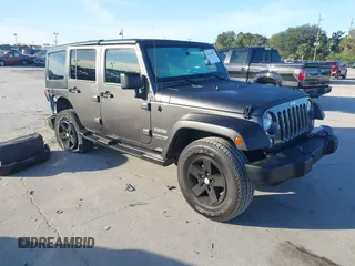 2018 Jeep Wrangler JK Unlimited Sport S with VIN 1C4BJWDG3JL900973, listed as a IAAI auction lot 41239817 with 50,952 mi miles. Bid and sale history available at carsss.com. Image 1.