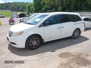 2012 Honda Odyssey EX-L with VIN 5FNRL5H62CB019238, listed as a IAAI auction lot 42524694 with 271,384 mi miles and . Bid and sale history available at DreamBid. Image 2.