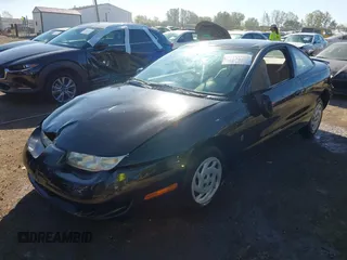1997 Saturn SC z VIN 1G8ZE1283VZ163658, wystawiony jako IAAI lot #40494467 z przebiegiem 111 701 mil mil oraz . Historia ofert i sprzedaży dostępna na DreamBid. Obrazek 2.