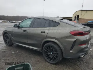 2023 BMW X6 xDrive40i z VIN 5UXCY6C03P9P48220, wystawiony jako Copart lot #51660845 z przebiegiem 24 947 mil mil oraz Szkoda całkowita • Salvage title. Historia ofert i sprzedaży dostępna na DreamBid. Obrazek 2.