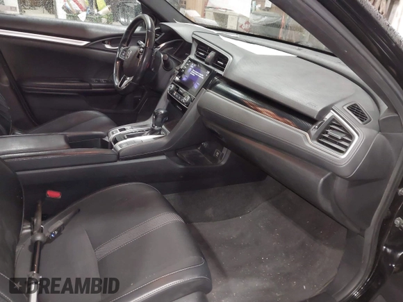 2019 Honda Civic Sport with VIN 2HGFC2F89KH557466, listed as a IAAI auction lot 42335216 with 138,747 mi miles and . Bid and sale history available at DreamBid. Image 5.