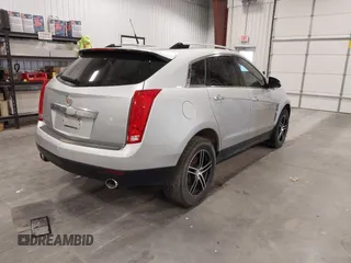 2010 Cadillac SRX Luxury Collection z VIN 3GYFNDEY0AS575446, wystawiony jako IAAI lot #42308817 z przebiegiem 165 402 mil mil oraz . Historia ofert i sprzedaży dostępna na DreamBid. Obrazek 4.