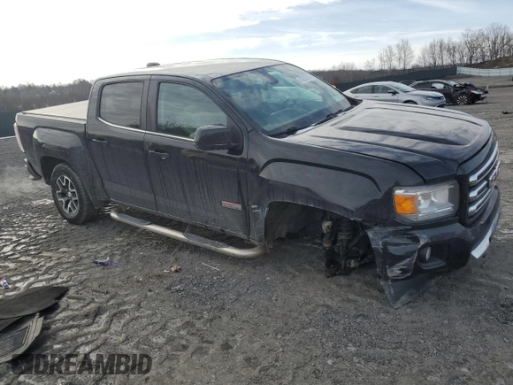 2015 GMC Canyon 4WD SLE with VIN 1GTG6BE34F1165547, listed as a Copart auction lot 43930715 with 124,970 mi miles and Salvage Title. Bid and sale history available at carsss.com. Image 4.