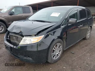 2012 Honda Odyssey EX with VIN 5FNRL5H46CB096547, listed as a IAAI auction lot 41919700 with 165,882 mi miles and . Bid and sale history available at carsss.com. Image 2.