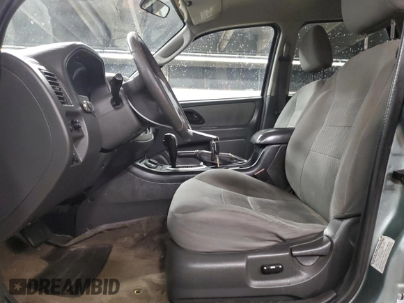 2007 Ford Escape Hybrid z VIN 1FMCU59H47KB00703, wystawiony jako Copart lot #51688245 z przebiegiem 194 296 mil mil oraz Szkoda całkowita • Salvage title. Historia ofert i sprzedaży dostępna na DreamBid. Obrazek 7.
