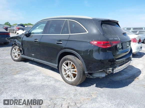 2023 Mercedes-Benz GLC with VIN W1NKM4HB6PU028035, listed as a IAAI auction lot 41469063 with 17,469 mi miles. Bid and sale history available at carsss.com. Image 3.