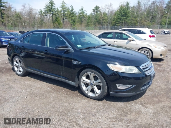 2011 Ford Taurus SHO z VIN 1FAHP2KT7BG188095, wystawiony jako IAAI lot #42180454 z przebiegiem 161 656 mil mil oraz . Historia ofert i sprzedaży dostępna na DreamBid. Obrazek 1.