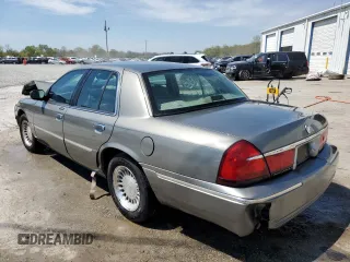 2001 Mercury Grand Marquis LS with VIN 2MEFM75W31X612800, listed as a Copart auction lot 50886005 with 58,400 mi miles and Salvage Title. Bid and sale history available at DreamBid. Image 2.