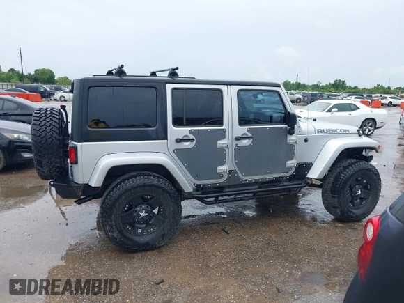 2012 Jeep Wrangler Unlimited Call of Duty MW3 with VIN 1C4BJWFG7CL281844, listed as a IAAI auction lot 42494946 with 93,669 mi miles and . Bid and sale history available at DreamBid. Image 13.