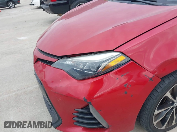 2017 Toyota Corolla L z VIN 5YFBURHE9HP610157, wystawiony jako IAAI lot #40999523 z przebiegiem 185 454 mil mil oraz . Historia ofert i sprzedaży dostępna na DreamBid. Obrazek 18.