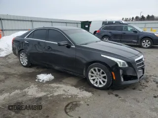 2014 Cadillac CTS AWD with VIN 1G6AW5SX6E0142793, listed as a Copart auction lot 43312545 with 101,124 mi miles and Salvage title. Bid and sale history available at DreamBid. Image 4.