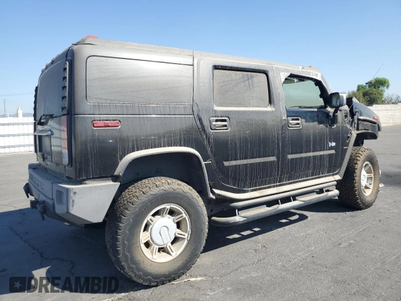 2004 Hummer H2 with VIN 5GRGN23U24H104327, listed as a Copart auction lot 74150914 with 181,933 mi miles and Salvage Title. Bid and sale history available at carsss.com. Image 3.