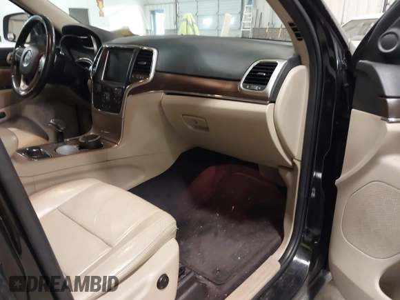 2015 Jeep Grand Cherokee Limited with VIN 1C4RJFBGXFC205124, listed as a IAAI auction lot 41405059 with 194,124 mi miles. Bid and sale history available at carsss.com. Image 5.