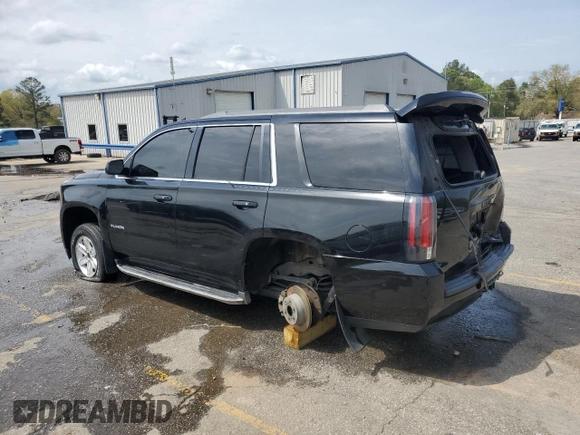 2015 GMC Yukon SLT with VIN 1GKS1BKC0FR113013, listed as a Copart auction lot 49821495 with 294,596 mi miles and Salvage Title. Bid and sale history available at carsss.com. Image 2.