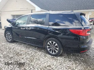 2023 Honda Odyssey EX-L with VIN 5FNRL6H69PB048988, listed as a Copart auction lot 50163455 with 35,475 mi miles and Salvage Title. Bid and sale history available at carsss.com. Image 2.
