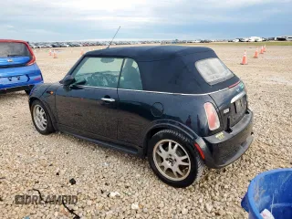 2005 MINI Convertible with VIN WMWRF33485TF61638, listed as a Copart auction lot 59822125 with 89,011 mi miles and Clean title. Bid and sale history available at DreamBid. Image 2.