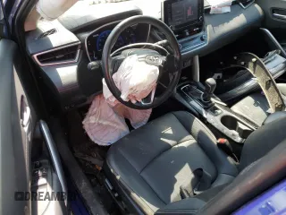 2022 Toyota Corolla Cross XLE with VIN 7MUDAABGXNV042443, listed as a Copart auction lot 57808565 with 102,887 mi miles and Salvage title. Bid and sale history available at DreamBid. Image 8.