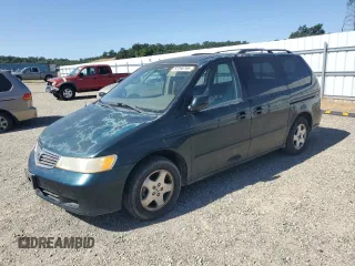 2000 Honda Odyssey EX z VIN 2HKRL1867YH587616, wystawiony jako Copart lot #57258795 z przebiegiem 219 999 mil mil oraz Szkoda całkowita • Salvage title. Historia ofert i sprzedaży dostępna na DreamBid. Obrazek 1.