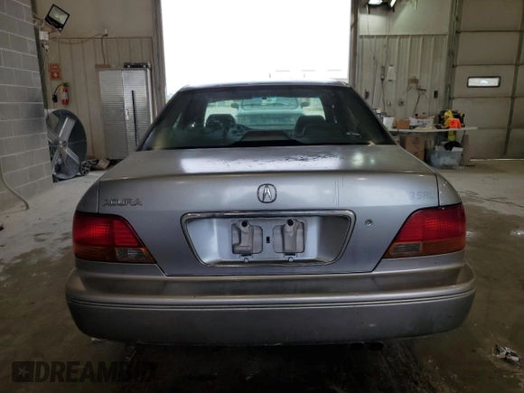 1998 Acura RL Premium with VIN JH4KA965XWC012742, listed as a Copart auction lot 73298574 with 0 mi miles and Salvage Title. Bid and sale history available at carsss.com. Image 6.