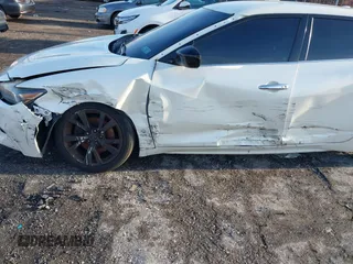 2017 Nissan Maxima SV z VIN 1N4AA6AP3HC360265, wystawiony jako IAAI lot #41164214 z przebiegiem 90 813 mil mil oraz . Historia ofert i sprzedaży dostępna na DreamBid. Obrazek 6.