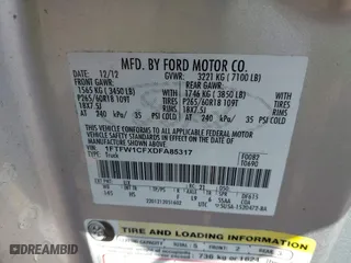 2013 Ford F-150 XL with VIN 1FTFW1CFXDFA85317, listed as a IAAI auction lot 41783100 with 148,127 mi miles. Bid and sale history available at carsss.com. Image 9.