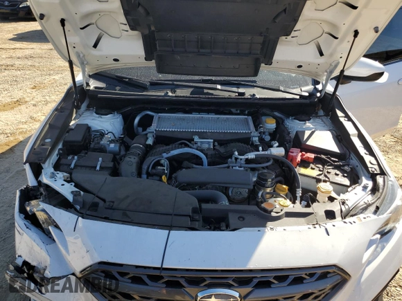 2023 Subaru WRX with VIN JF1VBAA66P9809569, listed as a Copart auction lot 76860074 with 19,786 mi miles and Salvage title. Bid and sale history available at DreamBid. Image 11.