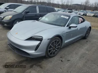 2022 Porsche Taycan z VIN WP0AA2Y11NSA14210, wystawiony jako Copart lot #72430792 z przebiegiem 3 932 mil mil oraz . Historia ofert i sprzedaży dostępna na DreamBid. Obrazek 1.