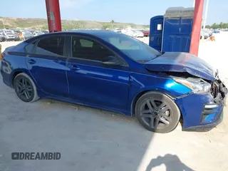 2021 Kia Forte GT-Line z VIN 3KPF34AD2ME386931, wystawiony jako IAAI lot #42333561 z przebiegiem 83 689 mil mil oraz . Historia ofert i sprzedaży dostępna na DreamBid. Obrazek 13.