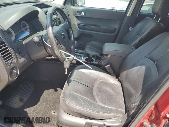 2008 Mazda Tribute Touring with VIN 4F2CZ96178KM28784, listed as a Copart auction lot 54736035 with 195,988 mi miles and Clean Title. Bid and sale history available at DreamBid. Image 7.