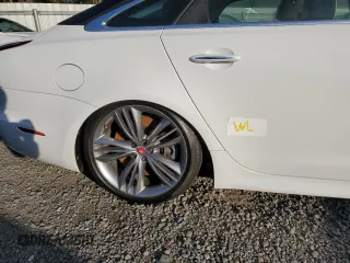 2016 Jaguar XJ with VIN SAJWA1CE4GMV91734, listed as a Copart auction lot 81005144 with 31,924 mi miles and Salvage Title. Bid and sale history available at DreamBid. Image 12.