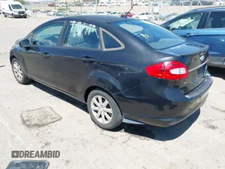 2011 Ford Fiesta SE z VIN 3FADP4BJ6BM121924, wystawiony jako IAAI lot #42453787 z przebiegiem 153 691 mil mil oraz . Historia ofert i sprzedaży dostępna na DreamBid. Obrazek 3.