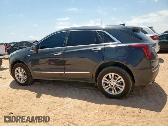 2020 Cadillac XT5 Luxury FWD z VIN 1GYKNAR47LZ173823, wystawiony jako Copart lot #56770025 z przebiegiem 74 192 mil mil oraz Szkoda całkowita • Salvage title. Historia ofert i sprzedaży dostępna na DreamBid. Obrazek 2.