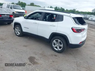 2024 Jeep Compass Latitude with VIN 3C4NJDBN9RT607209, listed as a IAAI auction lot 42233206 with 35,245 mi miles and . Bid and sale history available at DreamBid. Image 3.