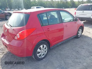 2012 Nissan Versa S with VIN 3N1BC1CP2CL374585, listed as a IAAI auction lot 42209609 with 196,501 mi miles. Bid and sale history available at carsss.com. Image 4.