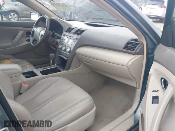 2007 Toyota Camry CE with VIN 4T1BE46K37U569515, listed as a IAAI auction lot 41974482 with 242,042 mi miles. Bid and sale history available at carsss.com. Image 5.