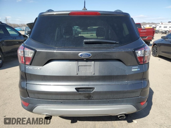 2018 Ford Escape SEL with VIN 1FMCU9HD7JUD59560, listed as a Copart auction lot 46841965 with 70,664 mi miles and Salvage Title. Bid and sale history available at carsss.com. Image 6.