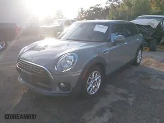 2019 MINI Clubman Cooper with VIN WMWLN5C59K2G82399, listed as a IAAI auction lot 41349514 with 64,235 mi miles. Bid and sale history available at carsss.com. Image 19.