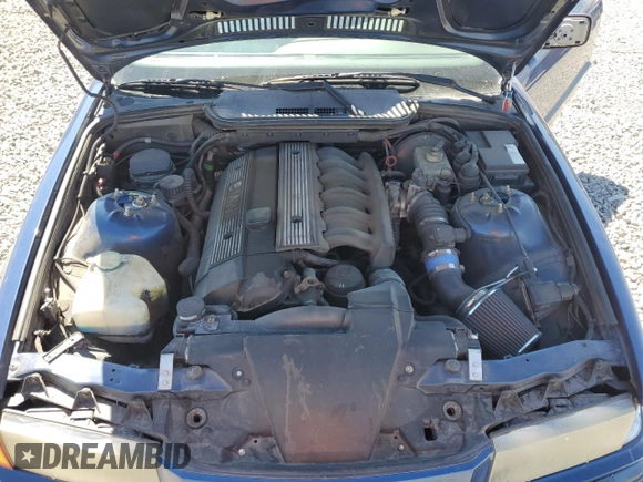 1998 BMW 3 Series 323i with VIN WBABJ8339WEM22707, listed as a Copart auction lot 55623685 with 130,704 mi miles and Salvage title. Bid and sale history available at DreamBid. Image 11.