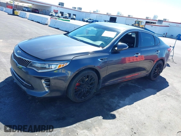 2016 Kia Optima SX Turbo with VIN 5XXGW4L29GG091635, listed as a IAAI auction lot 41884813 with 121,764 mi miles and . Bid and sale history available at carsss.com. Image 14.