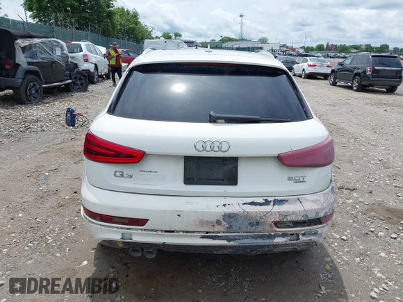 2015 Audi Q3 Premium Plus z VIN WA1EFCFS8FR001278, wystawiony jako IAAI lot #42475043 z przebiegiem 125 417 mil mil oraz . Historia ofert i sprzedaży dostępna na DreamBid. Obrazek 17.