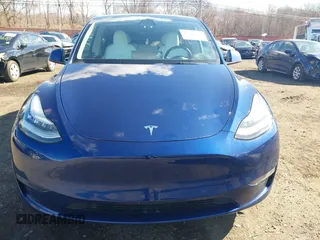 2021 Tesla Model Y Long Range with VIN 5YJYGDEE8MF293230, listed as a IAAI auction lot 41744033 with 56,797 mi miles and . Bid and sale history available at DreamBid. Image 12.