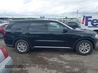 2014 Dodge Durango SXT with VIN 1C4RDHAG7EC560366, listed as a IAAI auction lot 42152736 with 164,590 mi miles and . Bid and sale history available at carsss.com. Image 14.