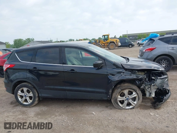 2014 Ford Escape SE z VIN 1FMCU9G9XEUA15367, wystawiony jako IAAI lot #42358528 z przebiegiem 145 994 mil mil oraz . Historia ofert i sprzedaży dostępna na DreamBid. Obrazek 13.