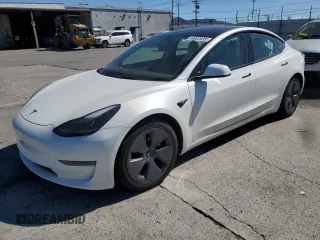 2022 Tesla Model 3 with VIN 5YJ3E1EAXNF203914, listed as a Copart auction lot 46982935 with 70,766 mi miles and Salvage Title. Bid and sale history available at DreamBid. Image 1.