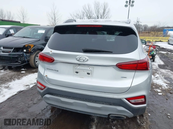 2019 Hyundai Santa Fe Ultimate with VIN 5NMS5CAD1KH000394, listed as a IAAI auction lot 41455421 with 42,886 mi miles and . Bid and sale history available at DreamBid. Image 16.